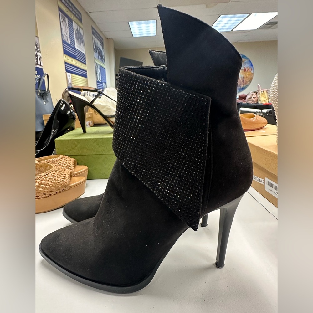 Black heeled boots.